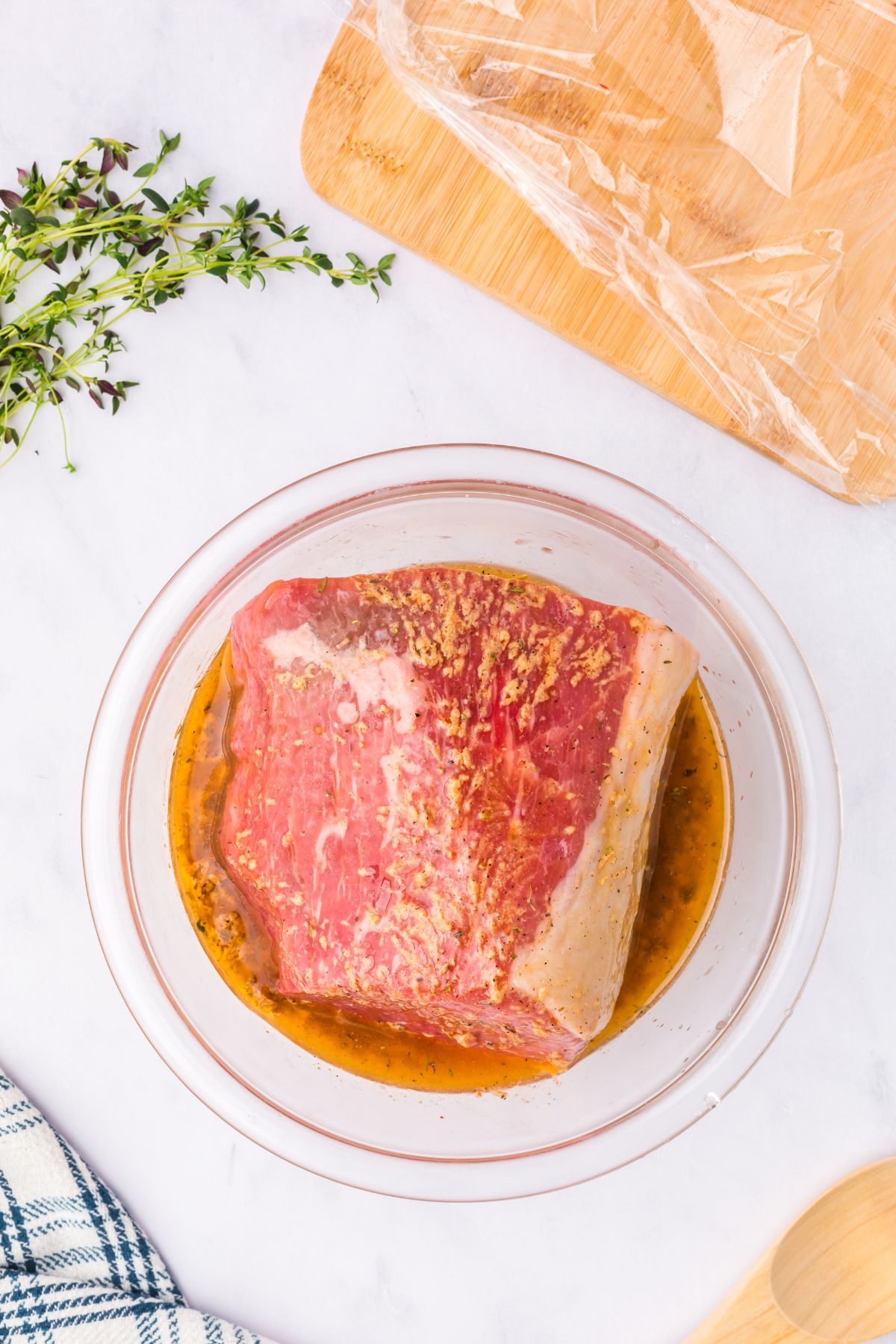 The roast coated in the rub.