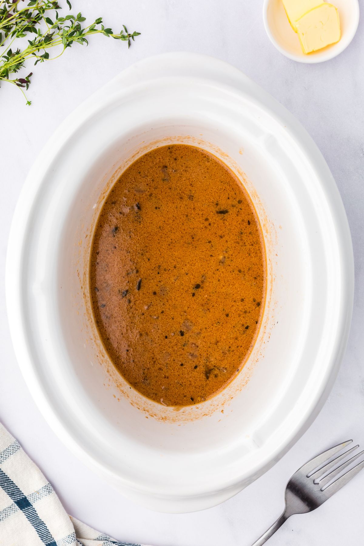 Gravy thickening in the slow cooker.