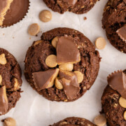 Reeses peanut butter cookies on parchment covered baking sheet.