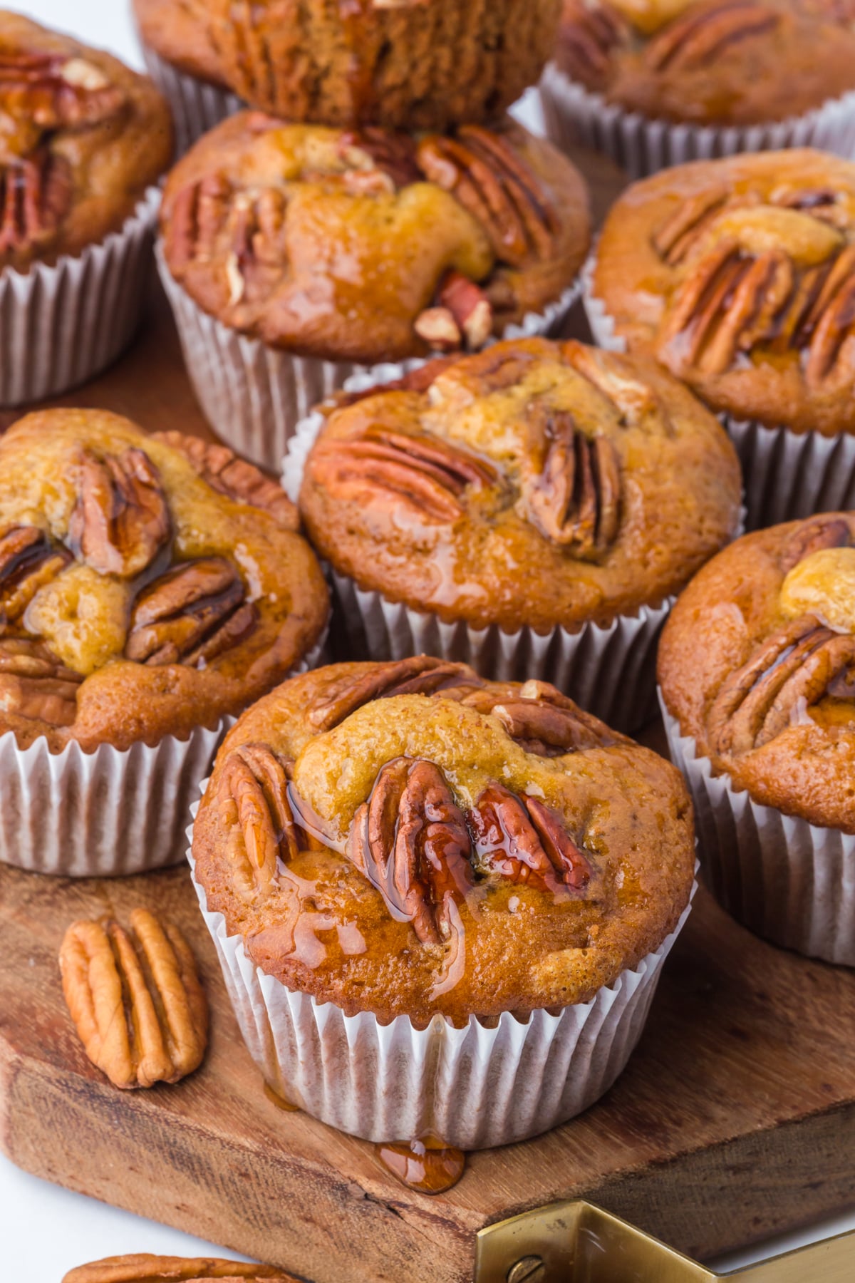 Finished muffins on a cutting board.