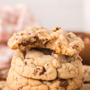 Maple pecan cookies stacked on top of the other.