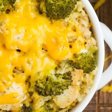 A bowl full of chicken broccoli rice.