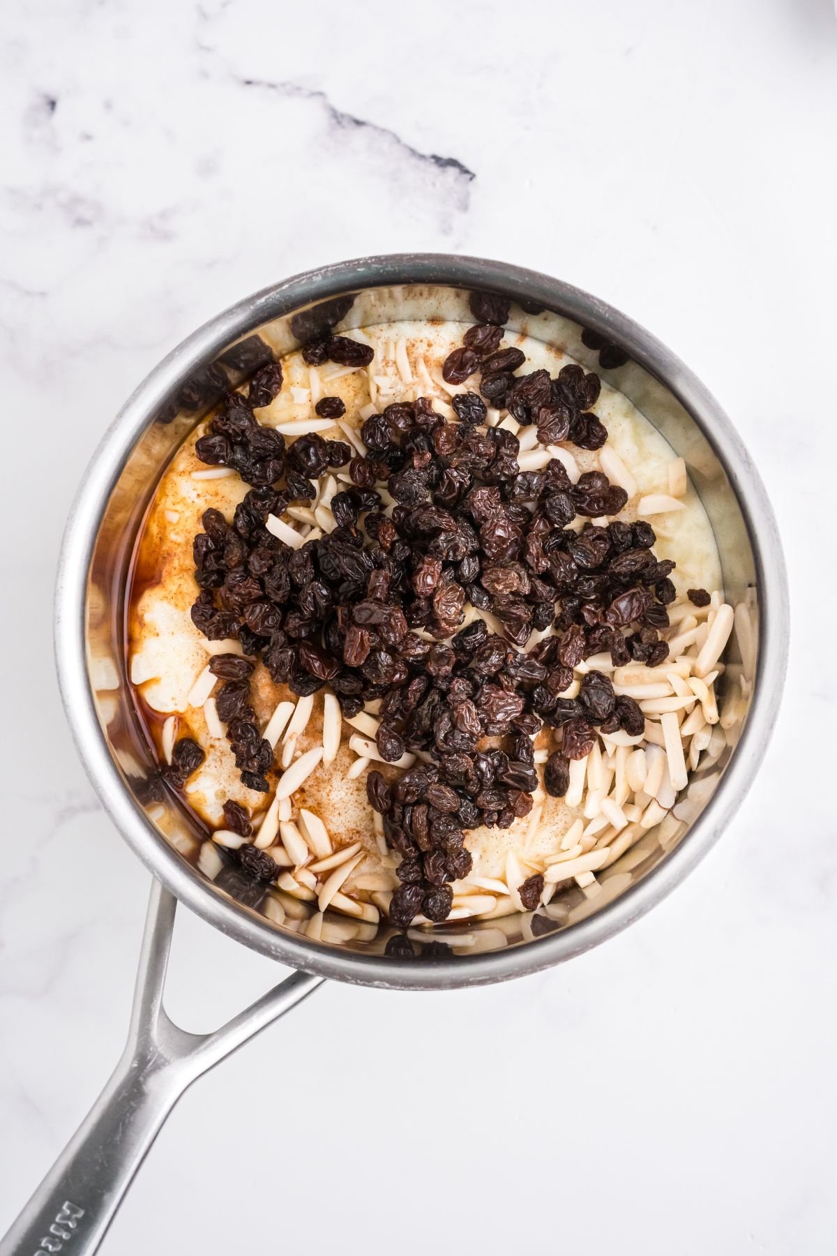 Raisins and almonds added to the rice pudding.