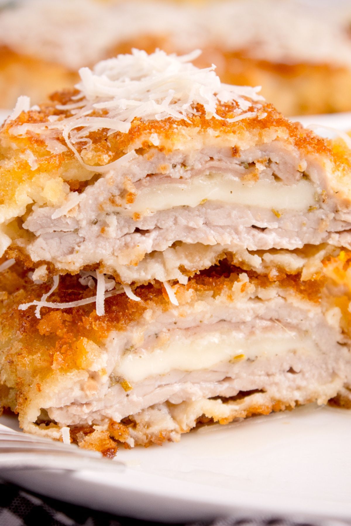 Veal cutlet stuffed with cheese and breadcrumbs on the outside. 