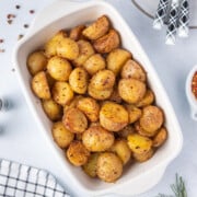 Air fryer baby potatoes in a casserole dish.