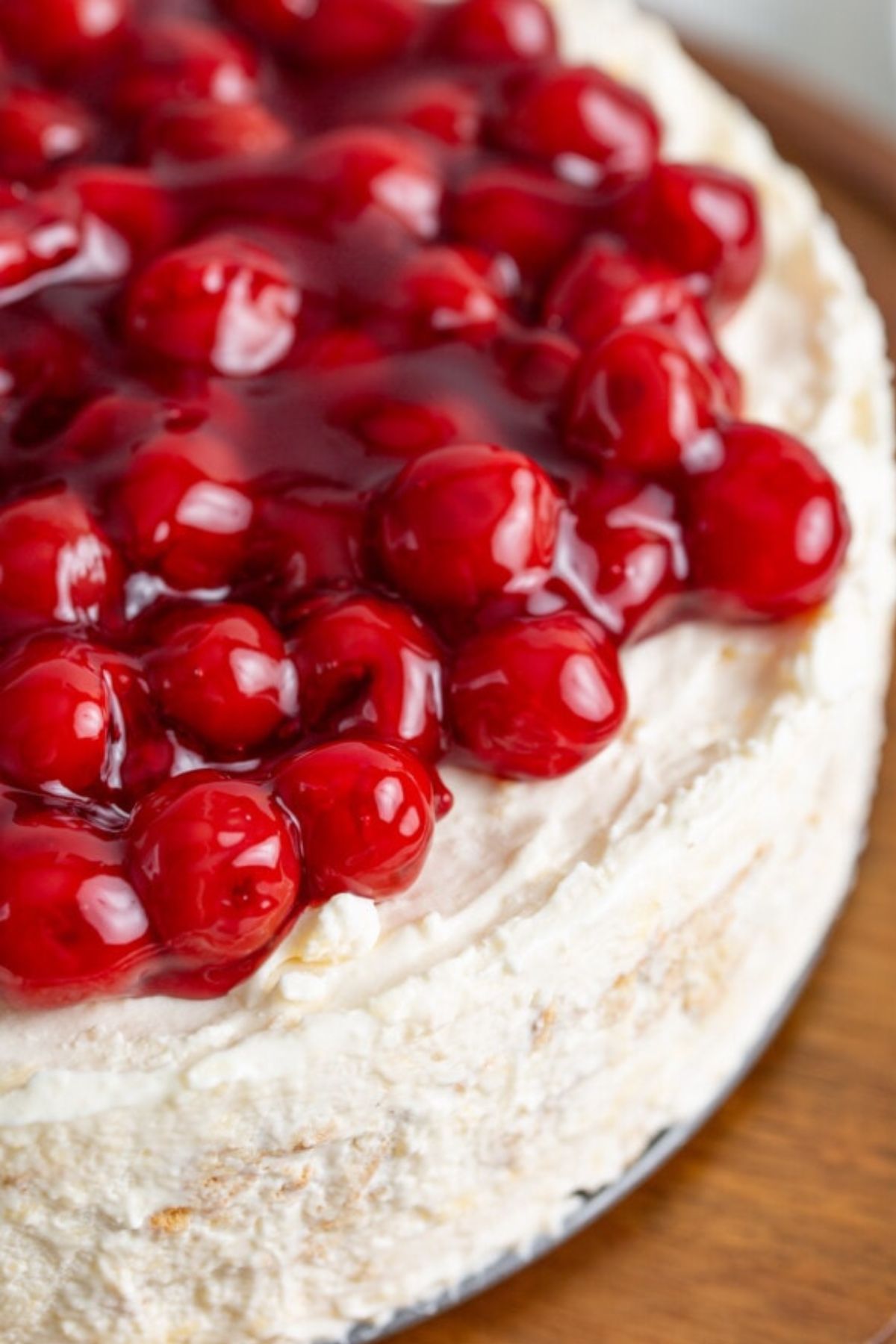 Cherry pie filling on top of an ice box cake.