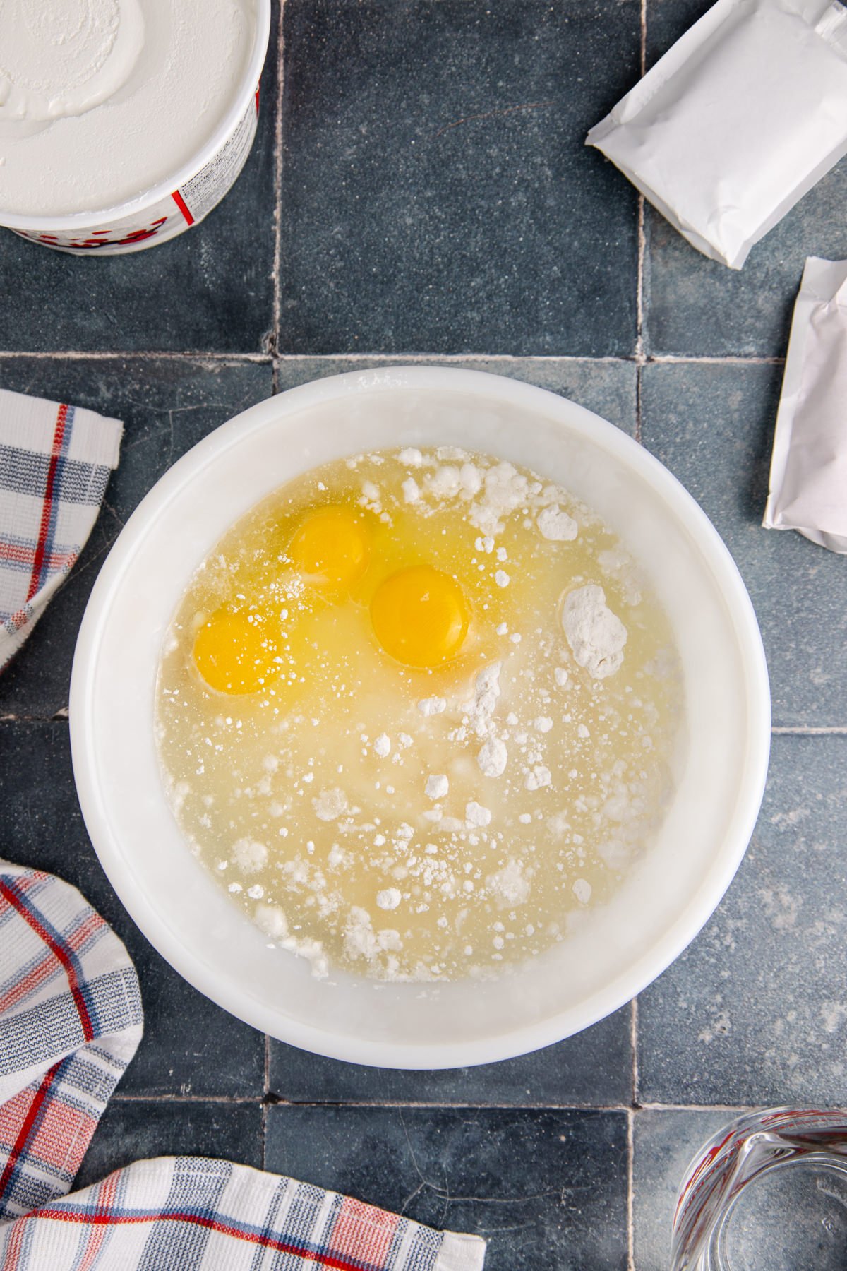 Eggs, cake mix, and oil in a bowl.