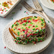 Overhead shot of two slices of funfetti bread on top of plate.