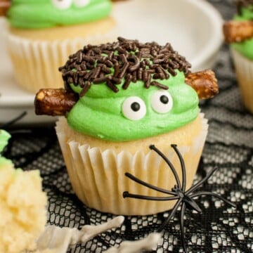Monster cupcakes with sprinkles and candy eyes.