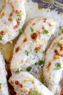 Chicken tenders with more mixture brushed on.