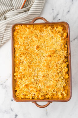 Baked mac and cheese cooling on a counter top.