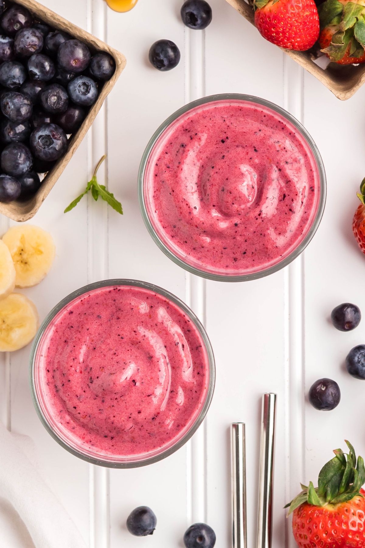 Finished blended smoothies in cups.