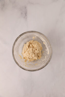 Dough removed from food processor and placed in a bowl.