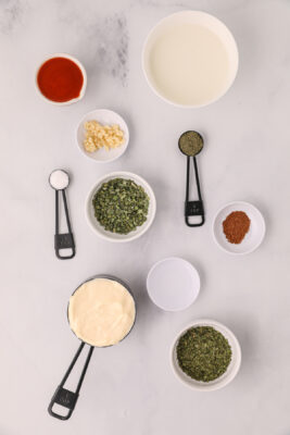 Ingredients to make buffalo ranch sauce on the table.