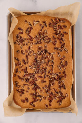 Tray of butter pecan cookies cooked in the sheet pan.