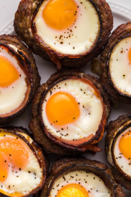 Overhead photo of cooked keto bacon egg cups.