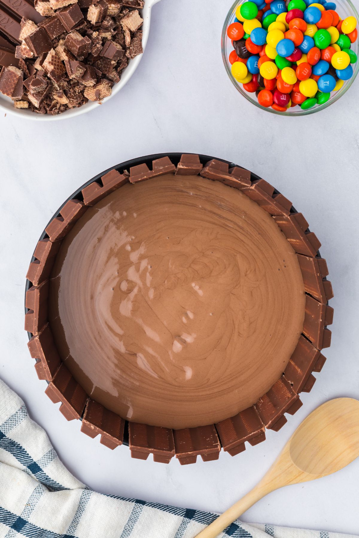 Softened chocolate poured on top of the crust.