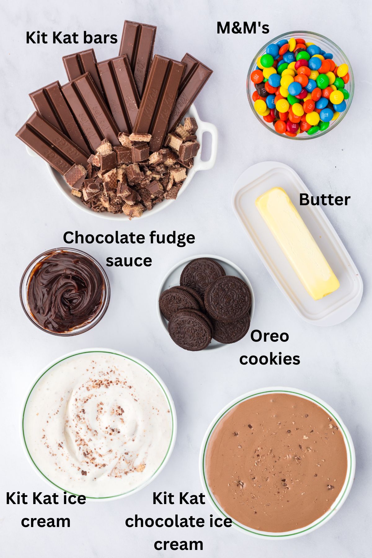 Ingredients to make a kit kat ice cream cake on the table.