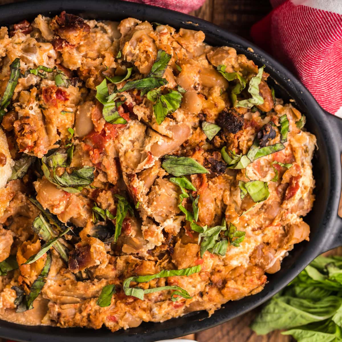 Cheesy White Bean Tomato Bake in a serving dish 