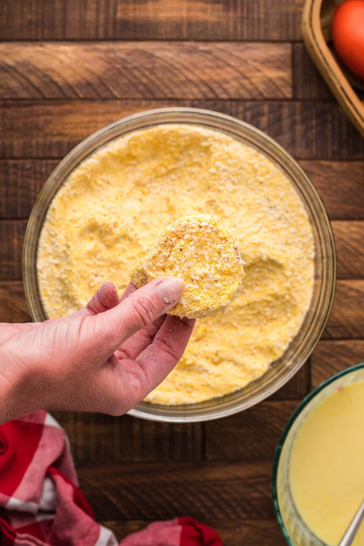 The tomatoes dipped into a cornmeal and flour mixture.