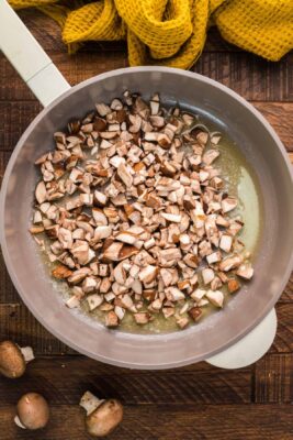 Mushrooms added to skillet.
