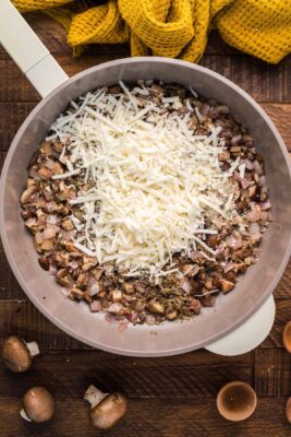 Cheese added to the skillet.