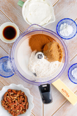Ingredients for streusel being added to food processor.