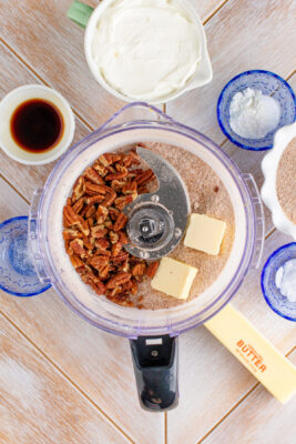 Butter and pecans added to food processor to make streusel.