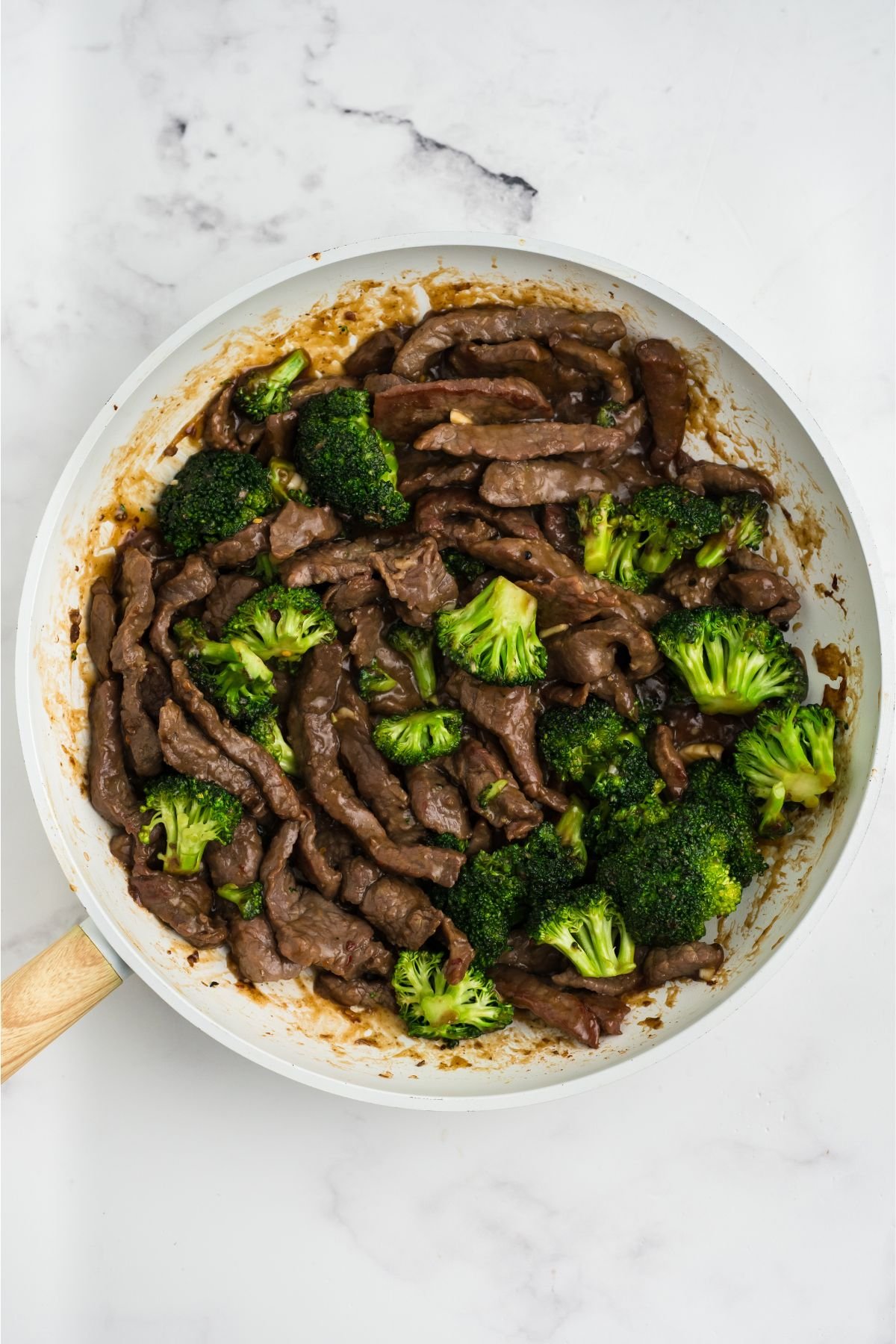Prepared sauce poured over the top of the beef and broccoli.