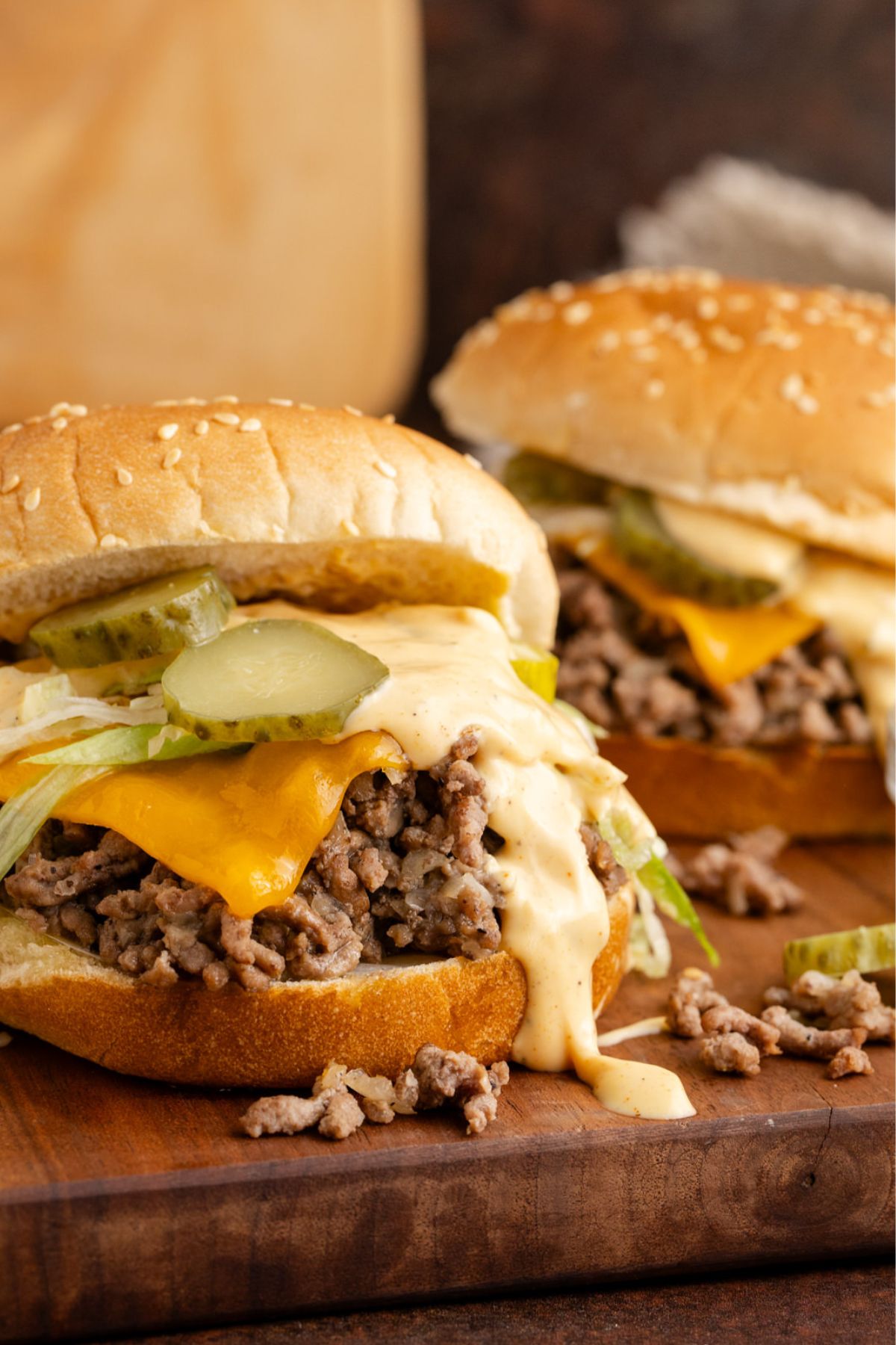 Cheese, ground beef, big mac sauce, lettuce, and pickles on a bun to make Big Mac sloppy Joes.