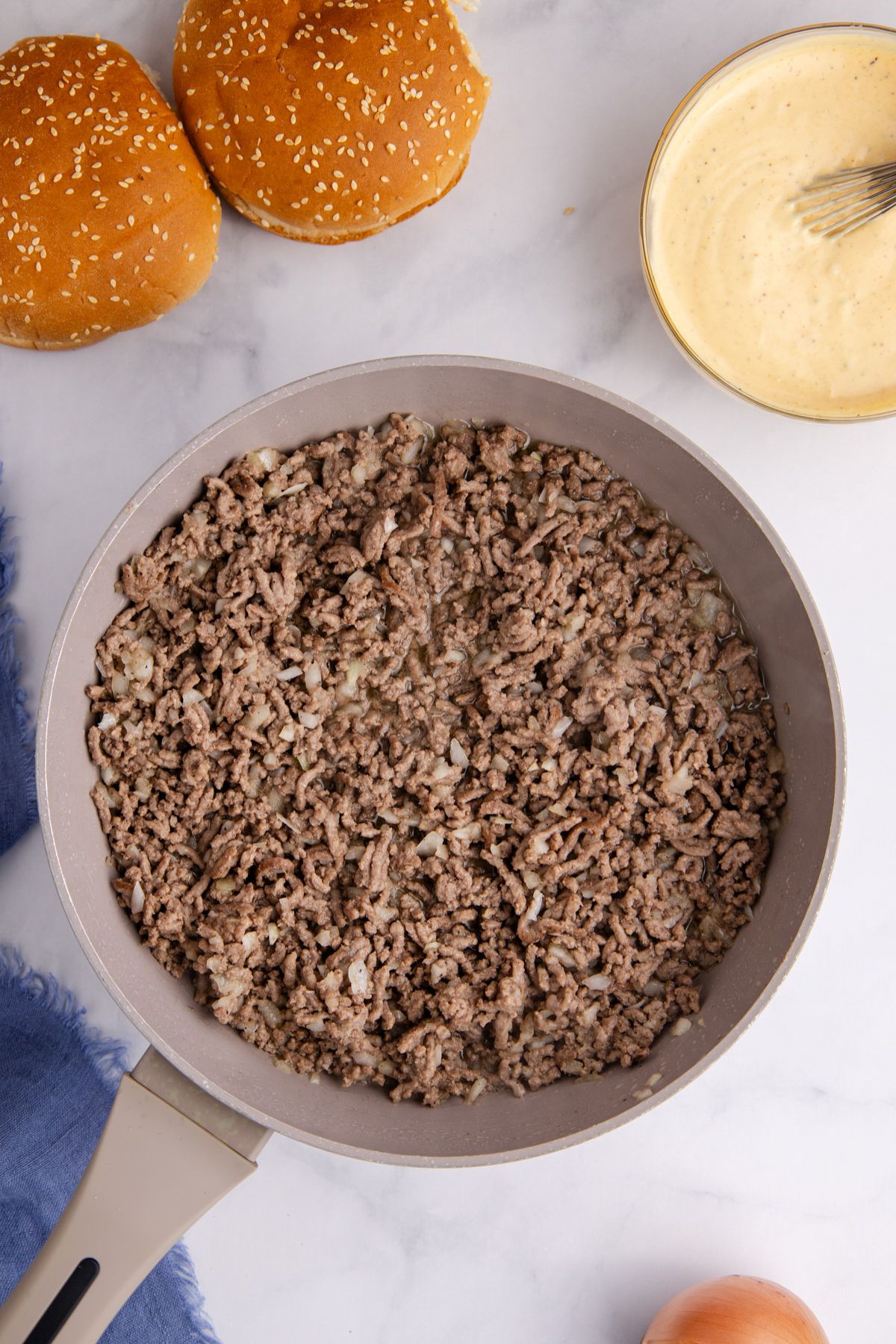 Worcestershire sauce, salt, and pepper added to the ground beef.