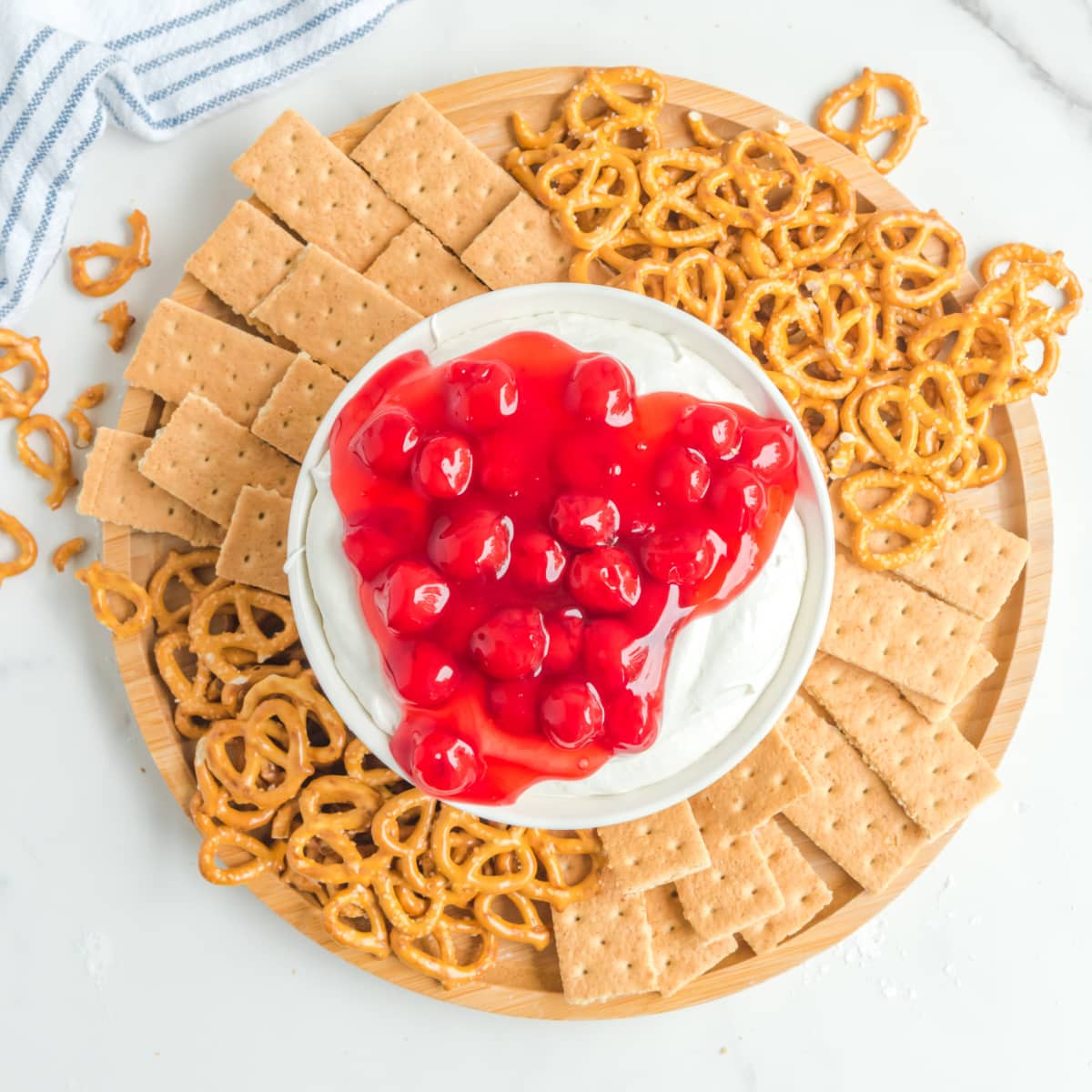 Creamy Cherry Cheesecake Dip with crackers and pretzels 