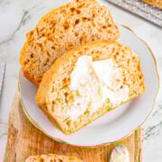 two onion soup bread 1968 bread slices on plate with butter on one slice