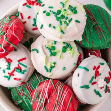 Bowl of oreos covered in icing and spinkles