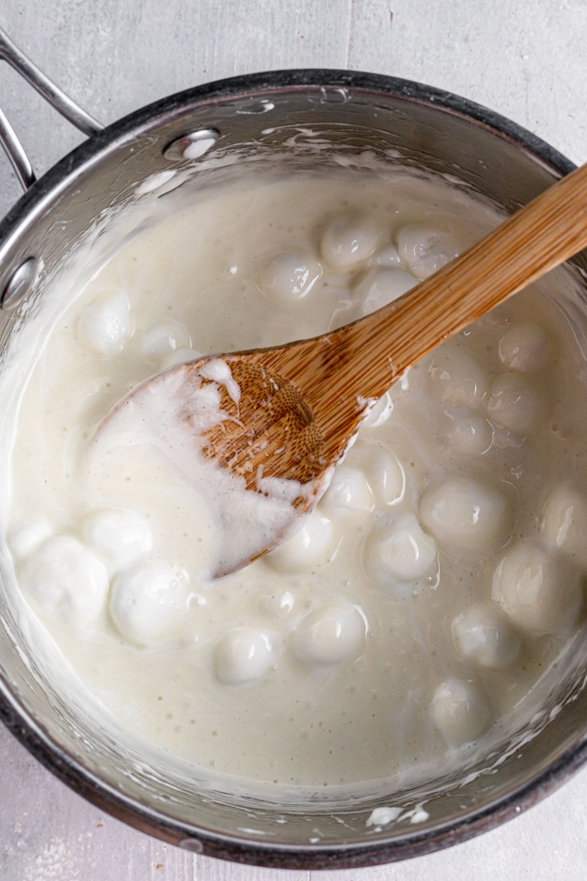Marshmallows added to the saucepan.