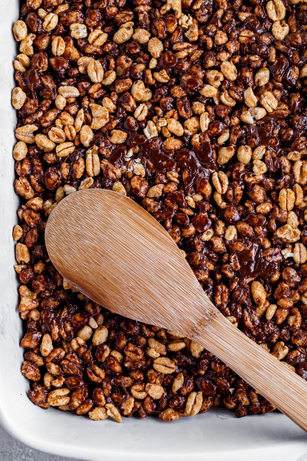 Golden crisp cereal transfered to a pan.