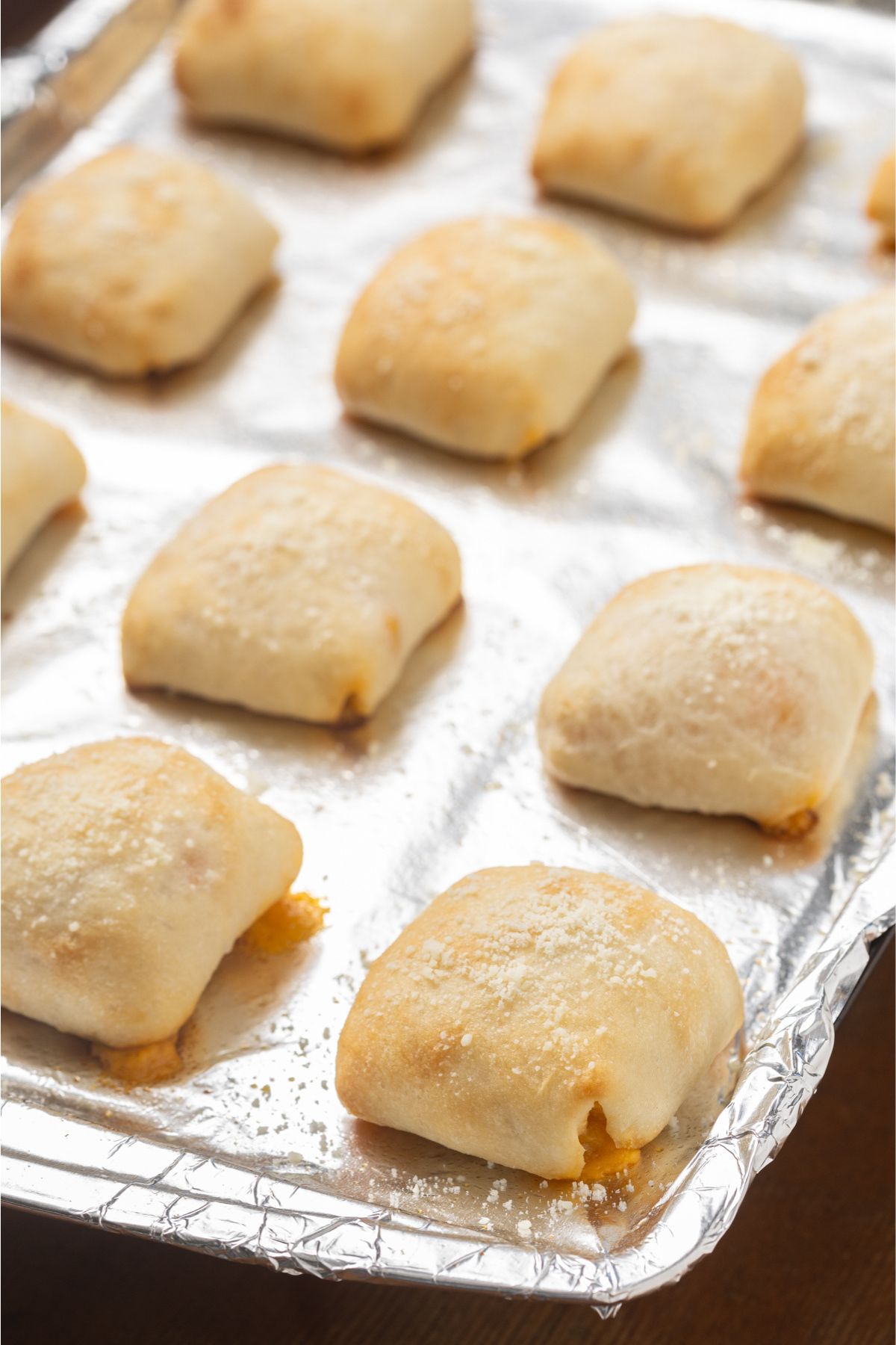 Parmesan cheese sprinkled on top of the baked bites.