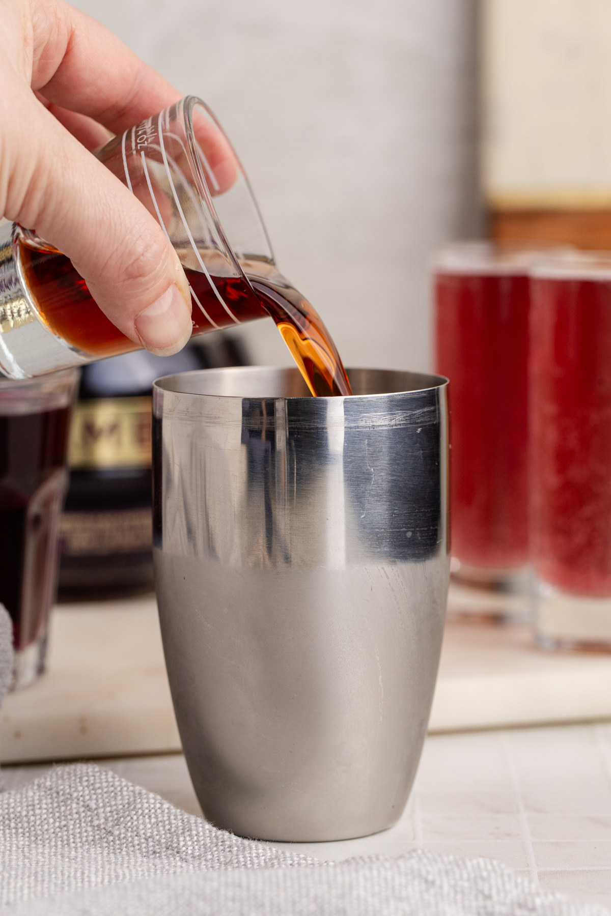 Grape juice added to shaker.