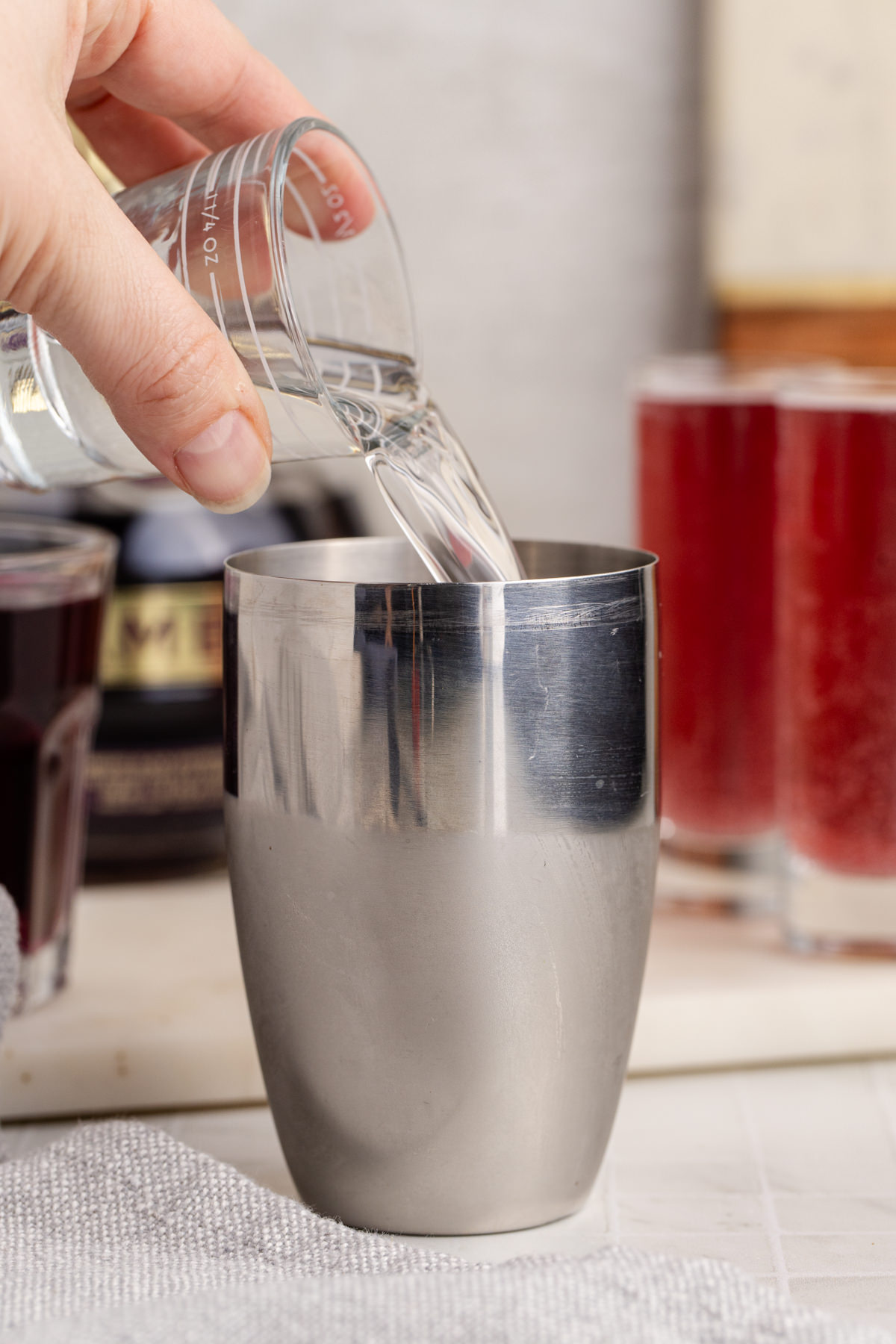 Vodka added to shaker.