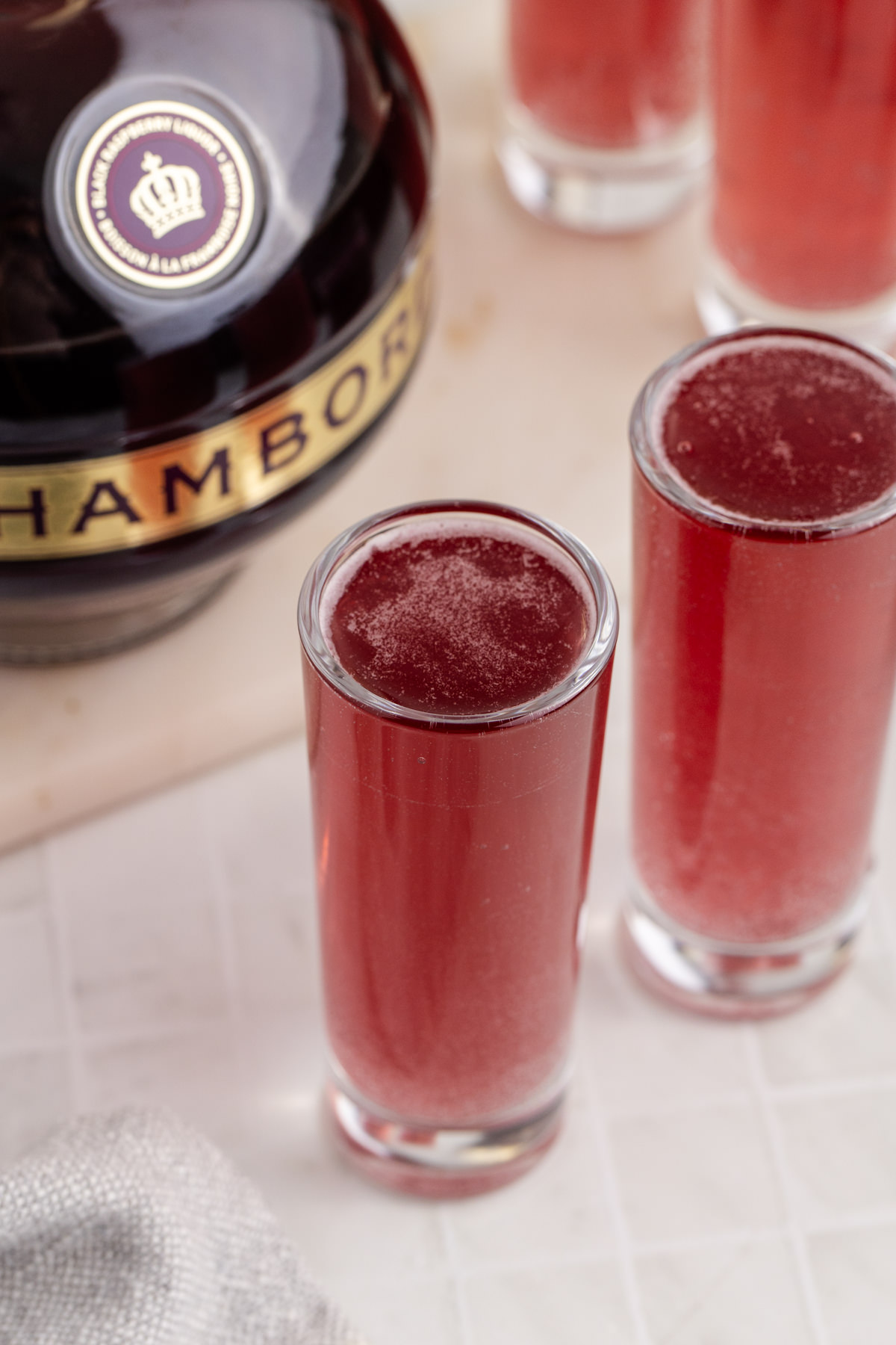 Shots on table with alcohol.