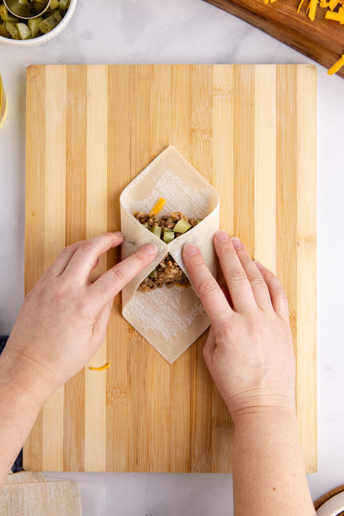 Filling added and starting to form the egg roll.