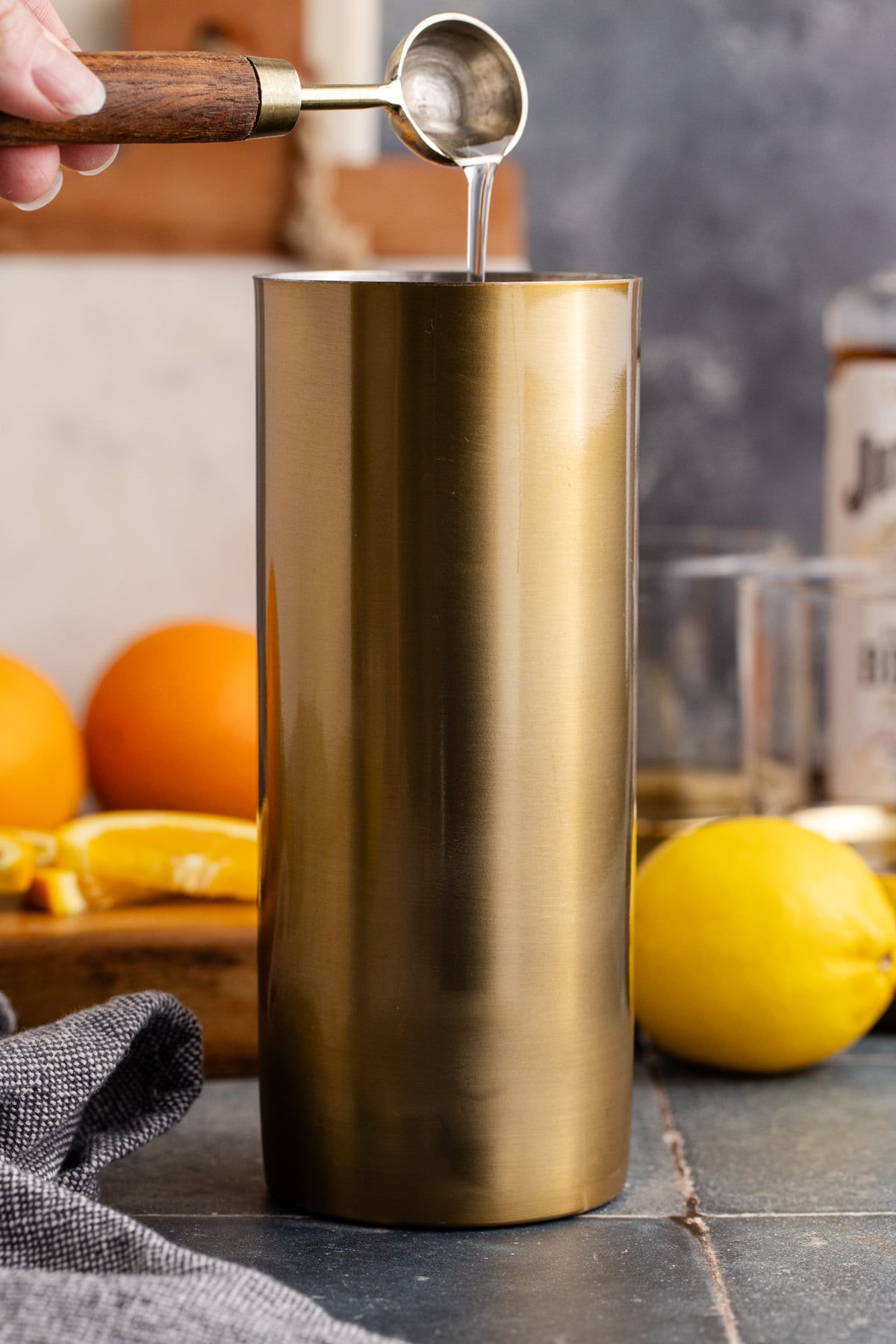 Ingredients added to coctail shaker ready to shake.