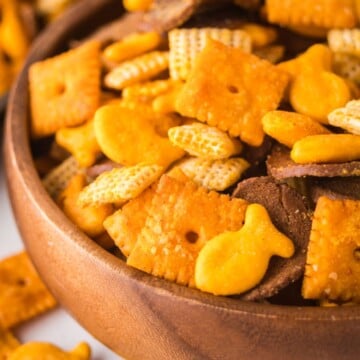 Cheddar Chex Mix in a wooden bowl.
