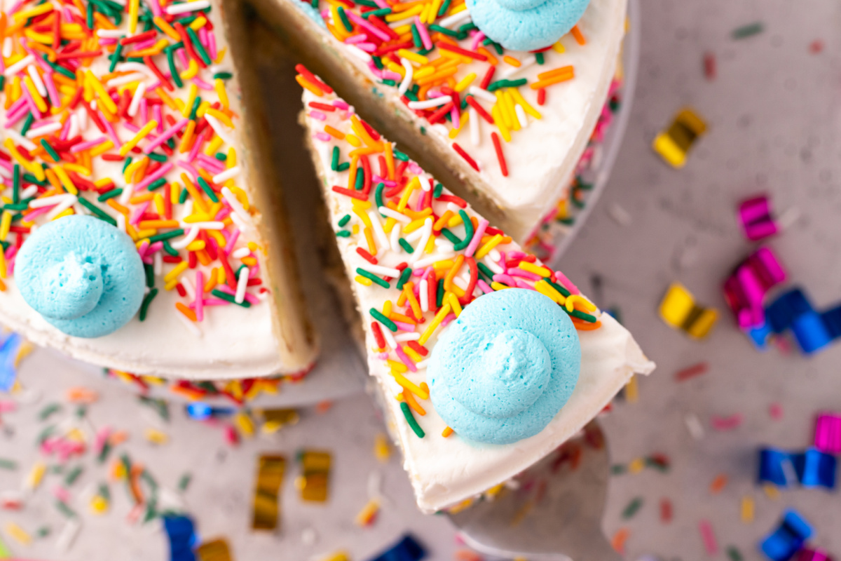 A slice being removed from the cake.