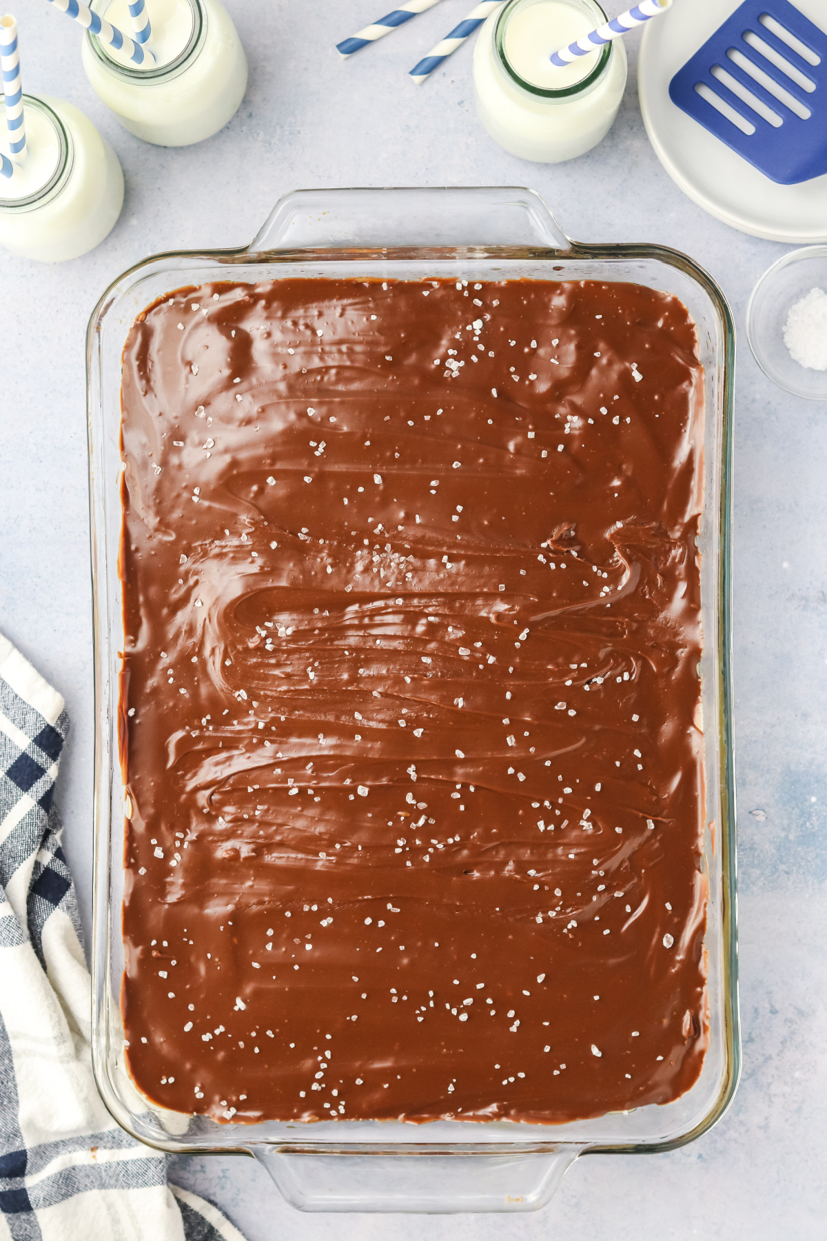 The ganache over the cooled caramel and sea salt sprinkled over the top of the ganache.