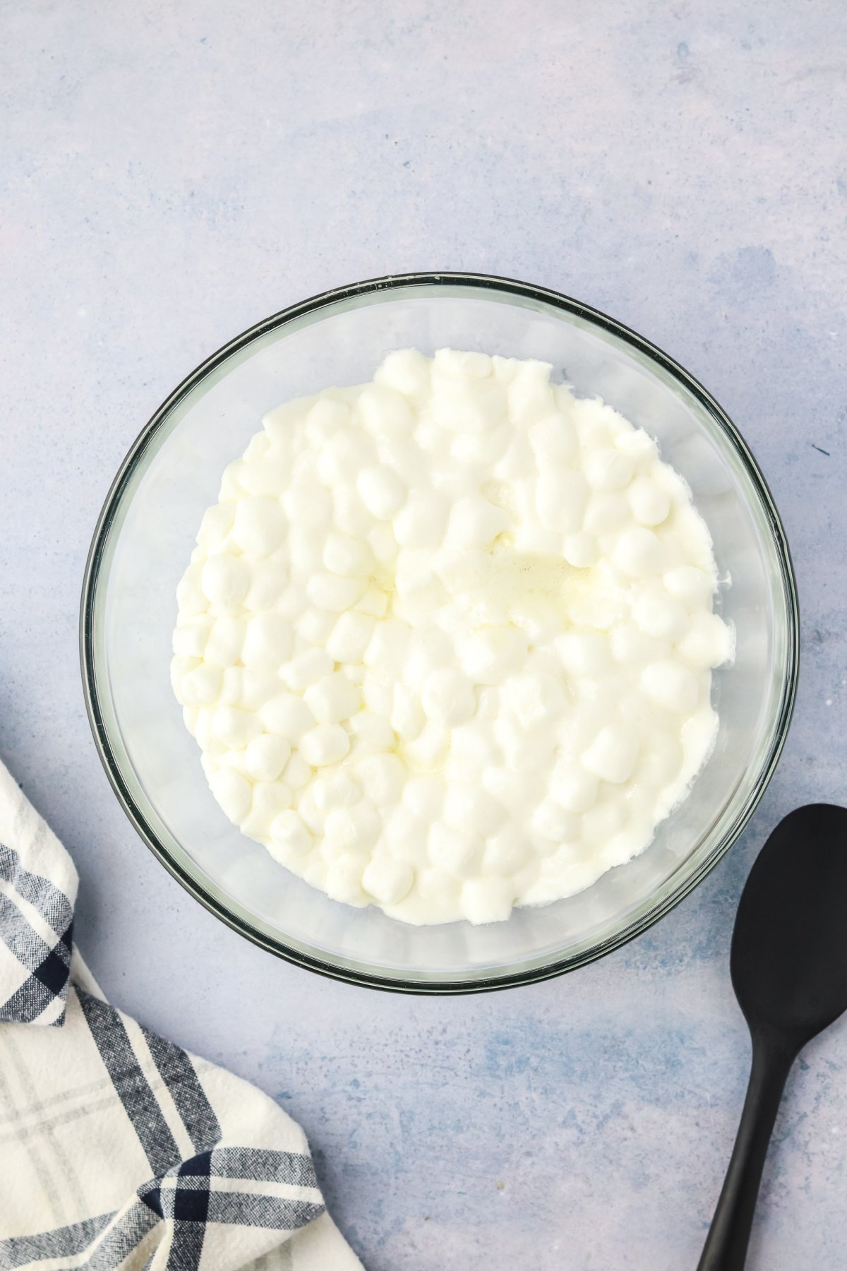 Marshmallows melted in a mixing bowl.
