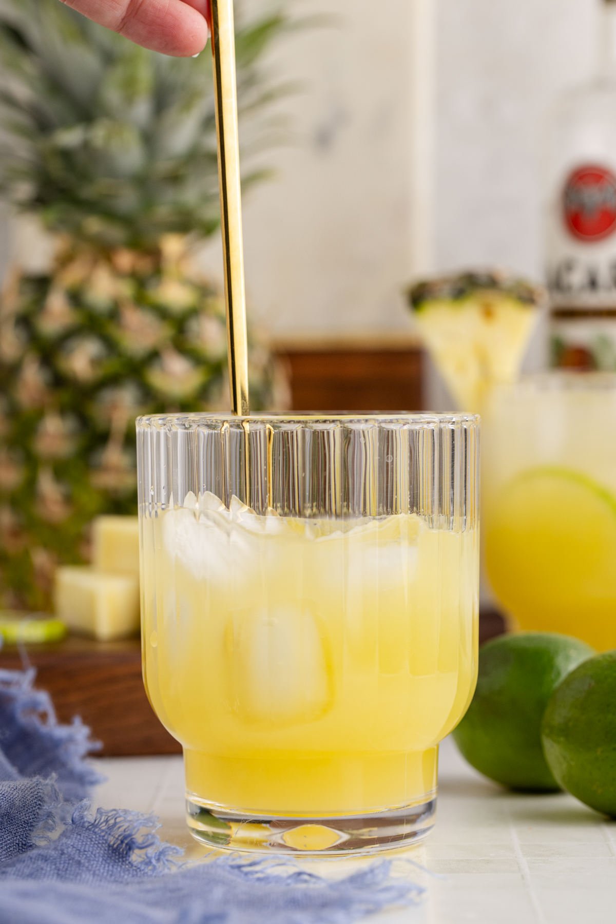 Mixing up the ingredients in the glass.