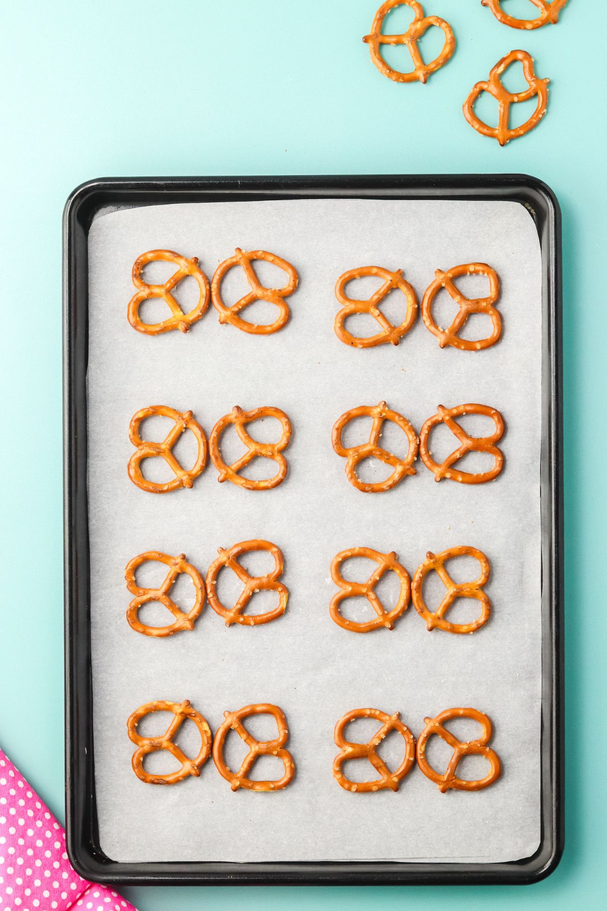 Two pretzel twists, end to end for each butterfly on a sheet tray.