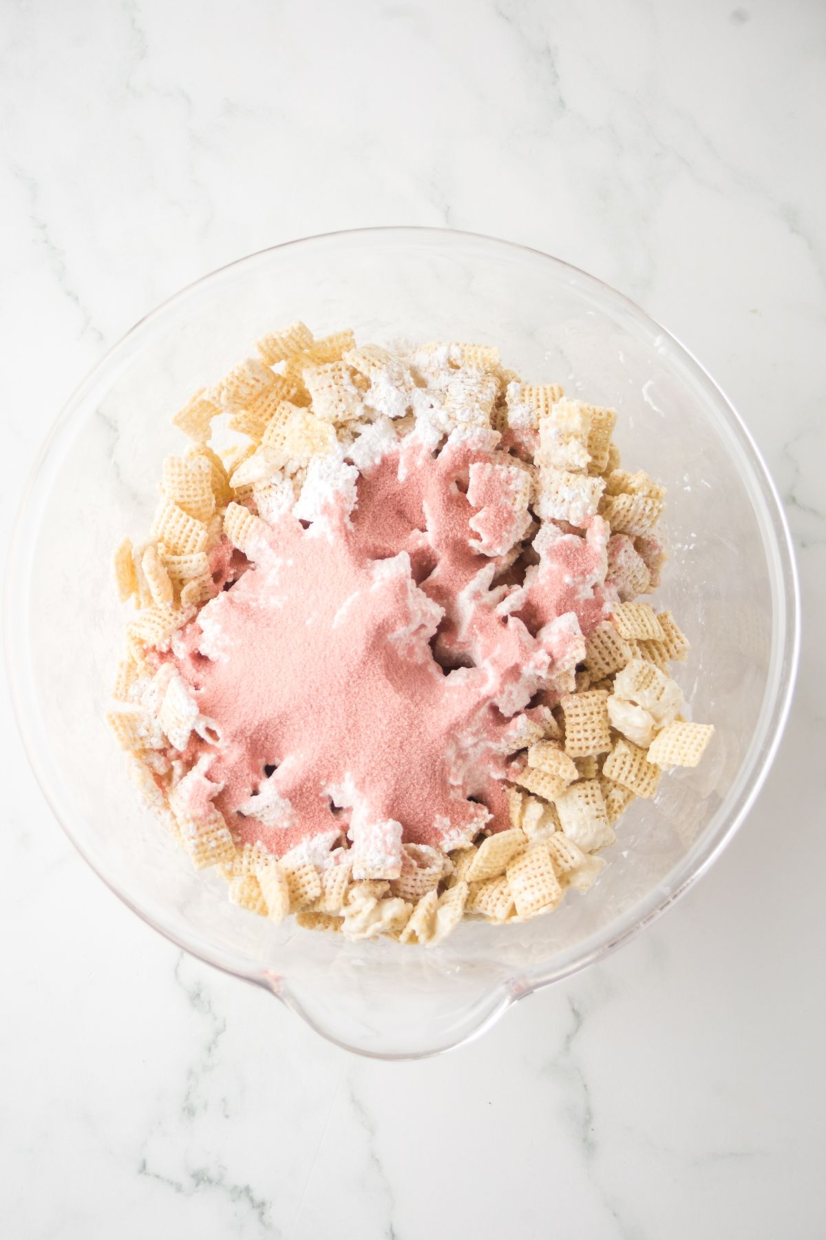 Powdered sugar and jell-o powder added to bowl before blending.