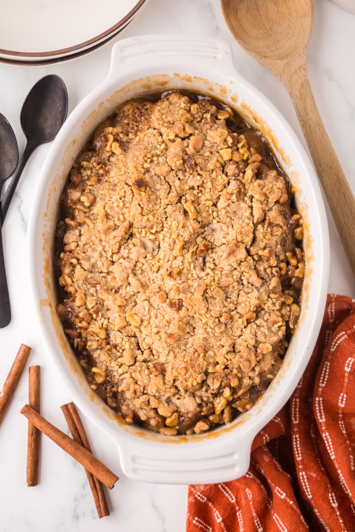 Banana cobbler assembled and baked in a baking dish.